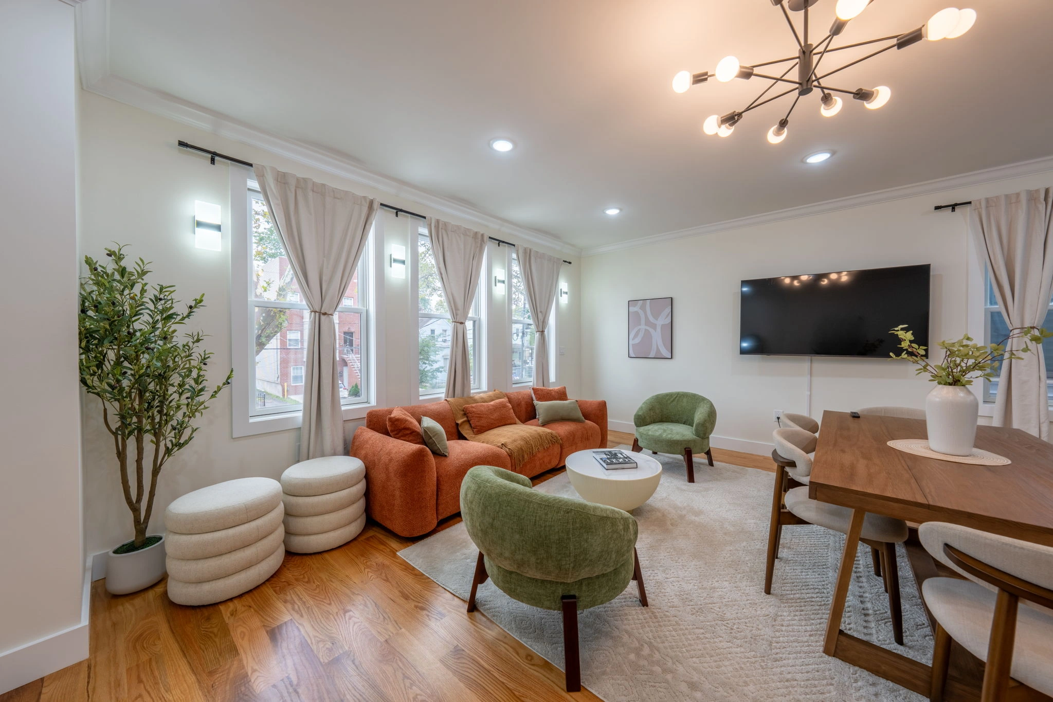 Bright living and dining room with colorful furnishings